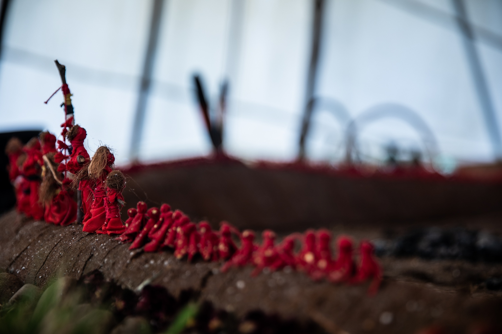 Red woven figures — ceremonial vessels of the Red Gold lineage